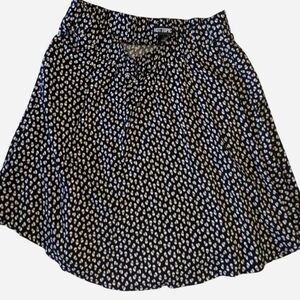 Hot Topic polkadot black & white skater mini skirt with heart eye shaped skull h